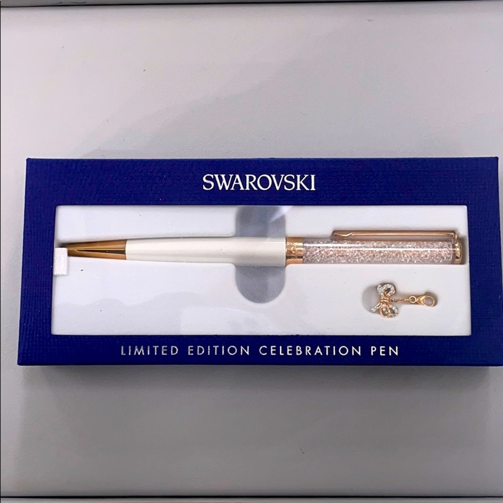 New in box, Swarovski pen with charm